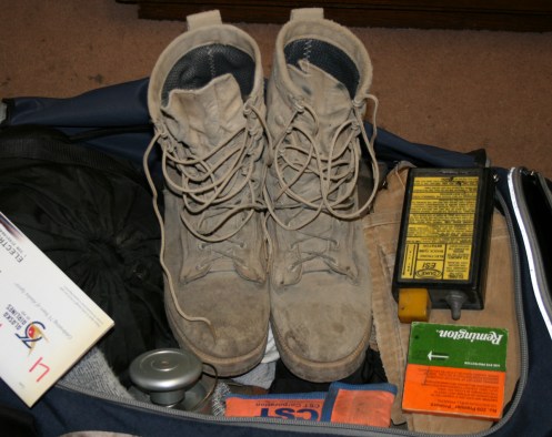 Wellco boots after a remote explosives engineering job and fighting a tundra fire.