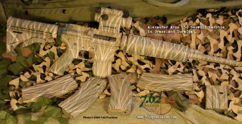 Alexander Arms .50 Beowulf upper on Rock River Arms lower with Aimpoint reflex sight and magazines finished in Grassland DuraCoat