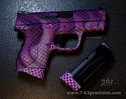 Crimson Trace Laser Grip DuraCoated to match pistol.